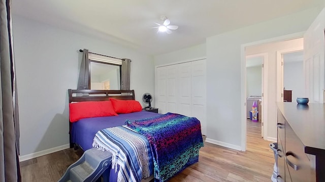 bedroom featuring hardwood / wood-style floors and a closet