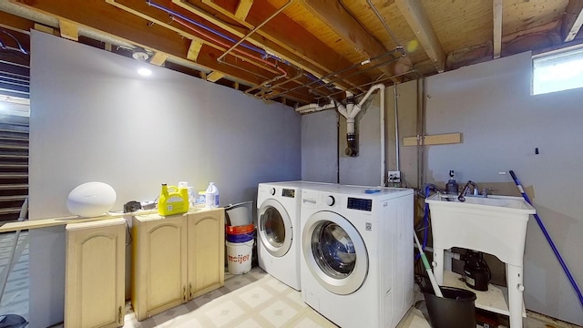 washroom featuring washer and dryer