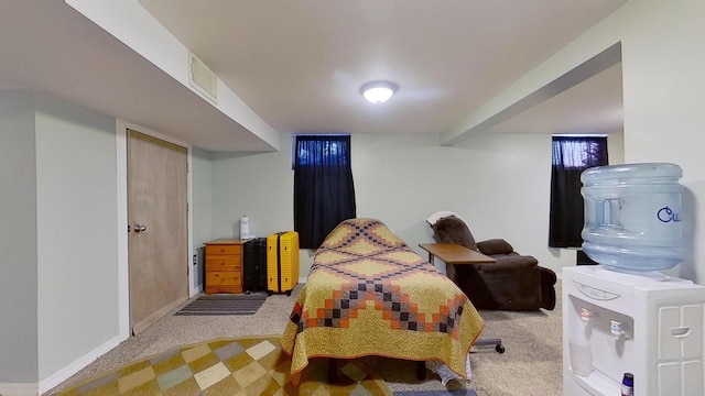 bedroom featuring light colored carpet