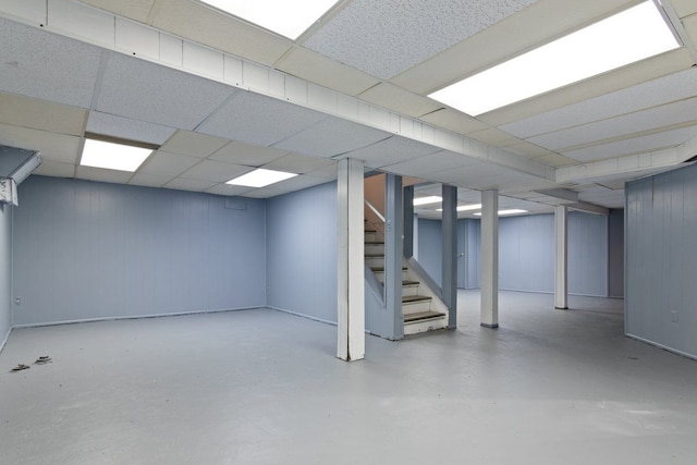 basement featuring a drop ceiling