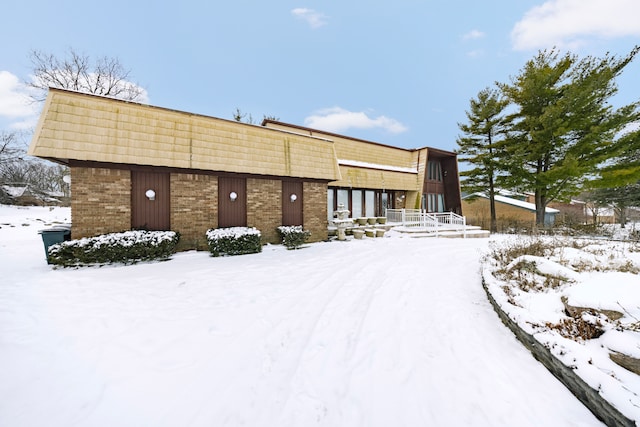 view of snow covered building