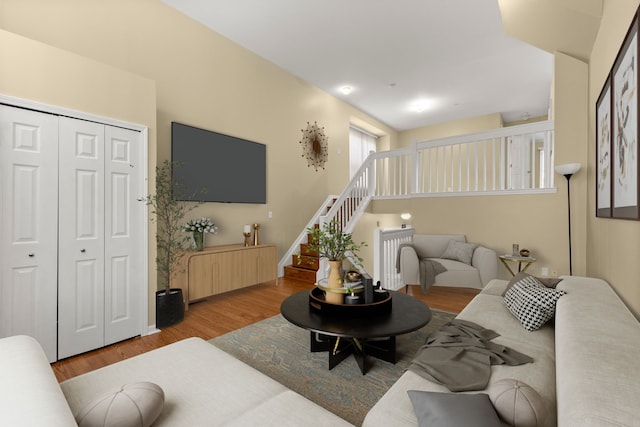 living room with light hardwood / wood-style flooring