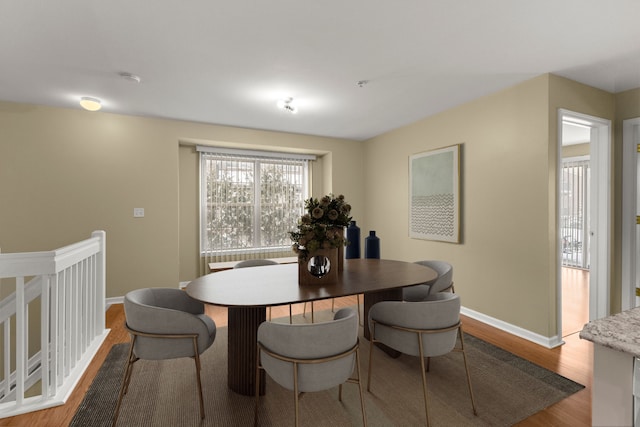 dining room with light wood-type flooring