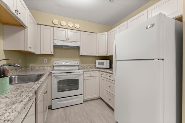 kitchen featuring white cabinetry, sink, and white appliances