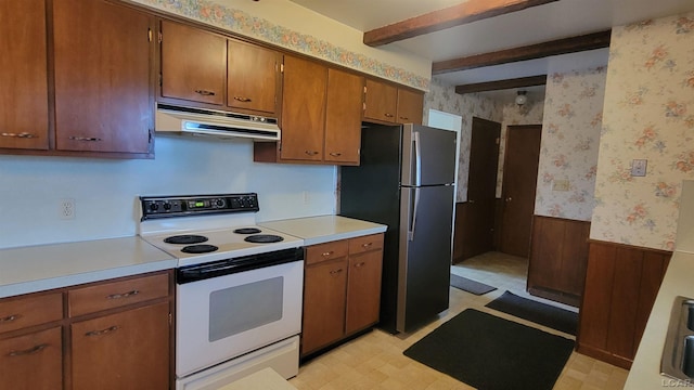 kitchen with beam ceiling, white range with electric cooktop, stainless steel fridge, and wooden walls