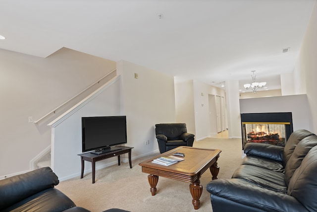 carpeted living room with a notable chandelier and a multi sided fireplace