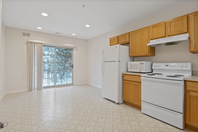 kitchen featuring white appliances