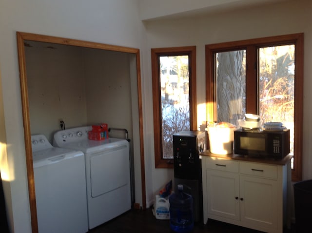 laundry room featuring washing machine and clothes dryer