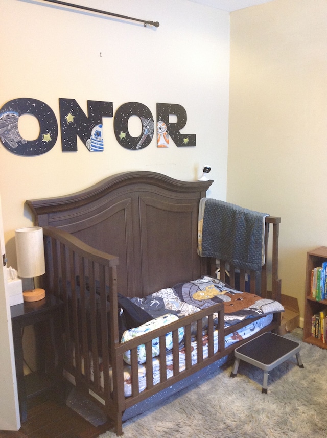 bedroom featuring carpet flooring