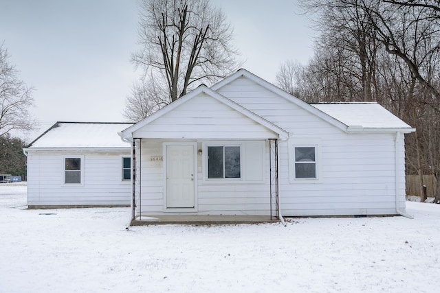 view of snow covered property