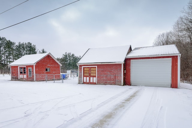 view of snow covered garage