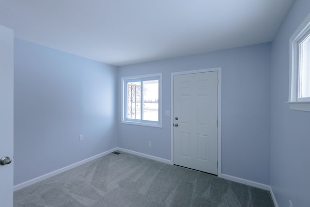 spare room with carpet floors