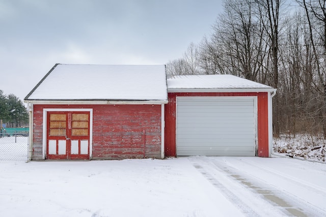 view of snow covered garage