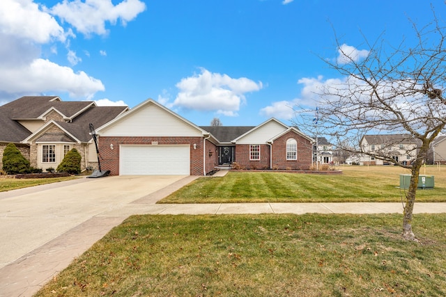 view of front of house featuring a front yard and a garage