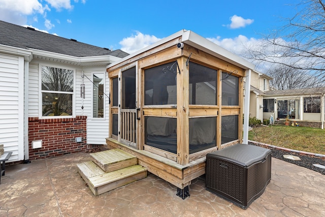 exterior space with a sunroom