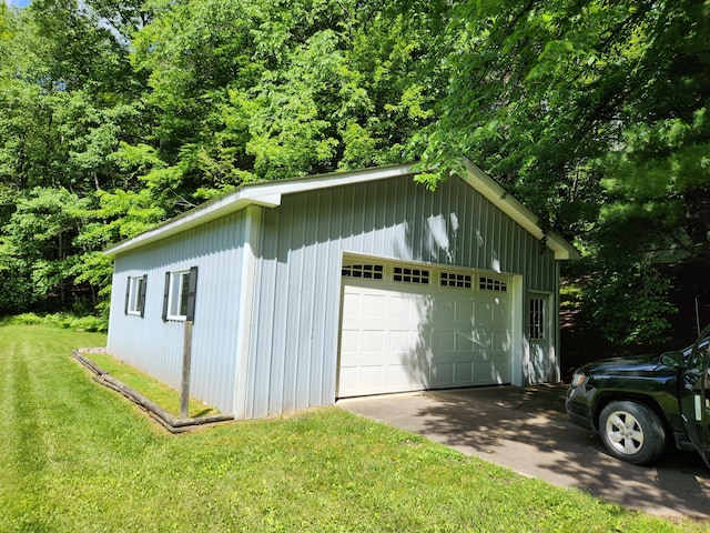 garage with a lawn