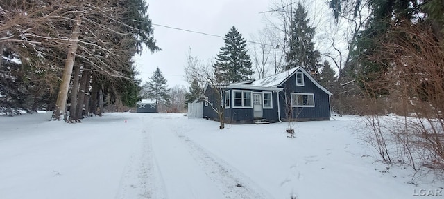 view of snow covered property