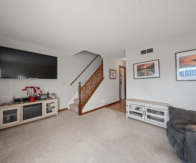 living room featuring carpet