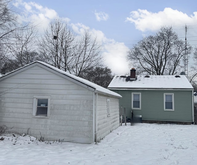 view of snow covered property