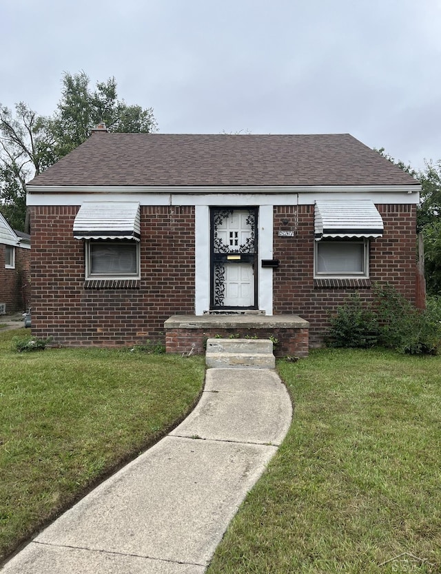 view of front of house with a front yard