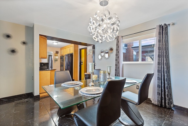 dining room featuring a notable chandelier