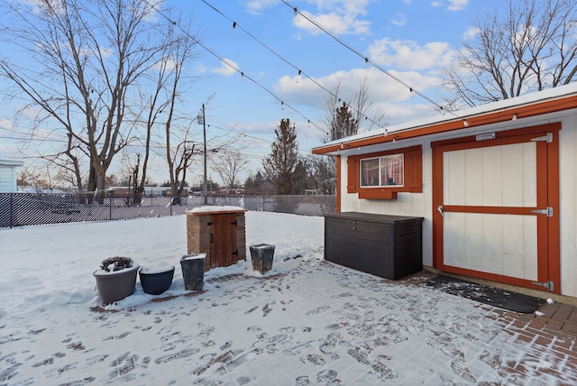 view of yard layered in snow