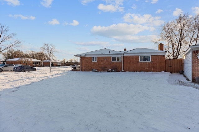 view of snow covered property