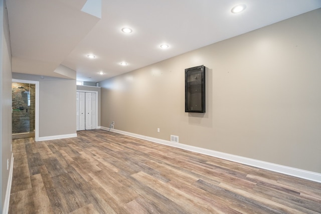 spare room featuring hardwood / wood-style floors