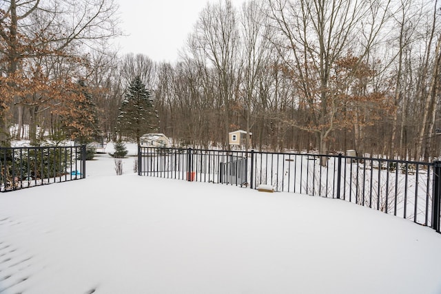 view of yard covered in snow