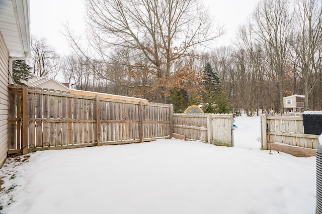 view of yard covered in snow