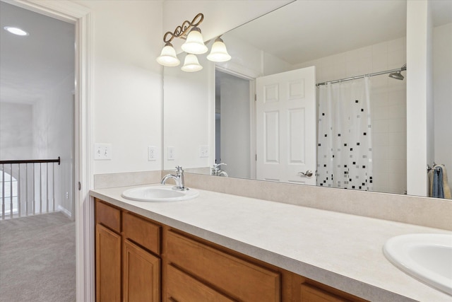 full bathroom with vanity and a shower with shower curtain