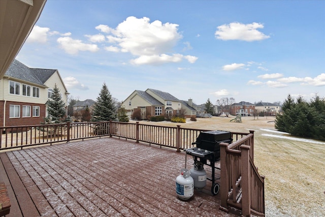 wooden terrace with a residential view