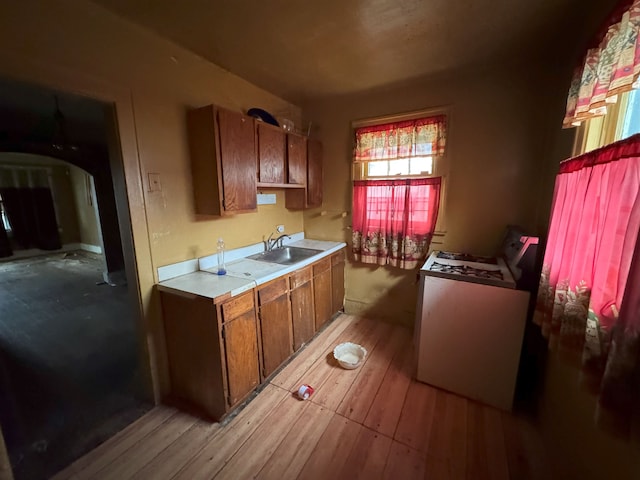 kitchen with sink and light wood-type flooring