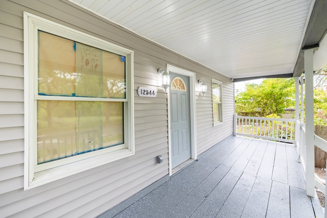 wooden deck featuring a porch