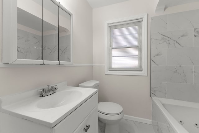 full bathroom featuring vanity, tiled shower / bath combo, and toilet