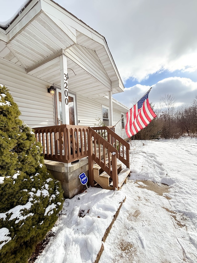 view of snow covered deck