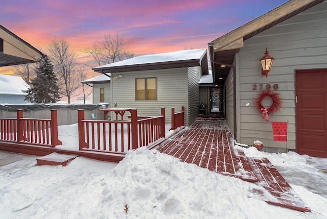 view of snow covered deck