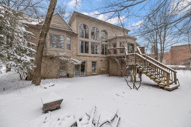 view of snow covered property