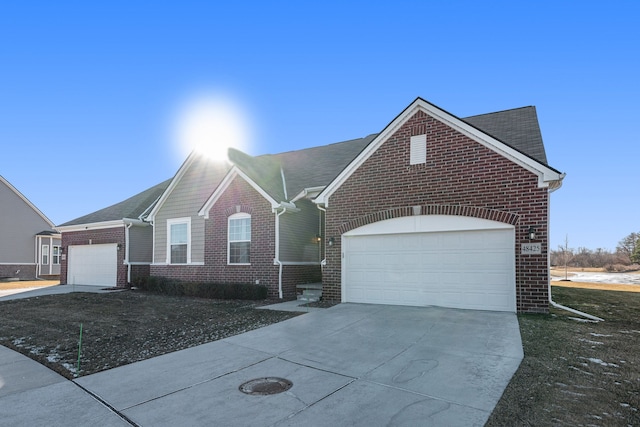 single story home featuring a garage