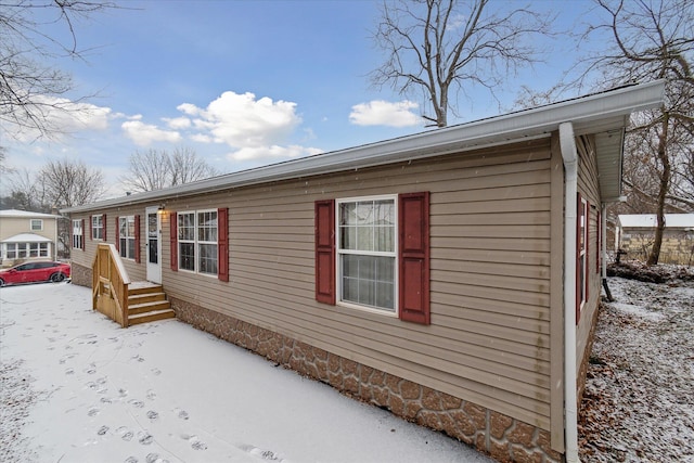 view of snow covered property