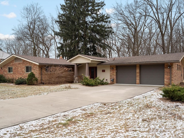 single story home with a garage