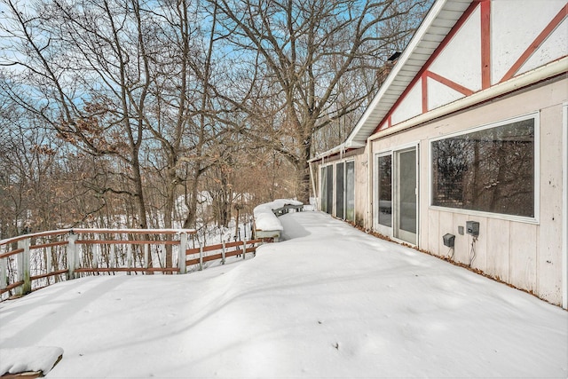 view of snow covered deck