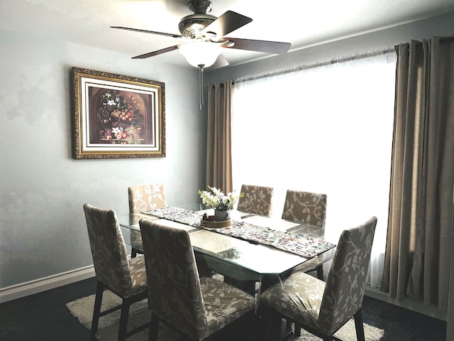 dining room with ceiling fan