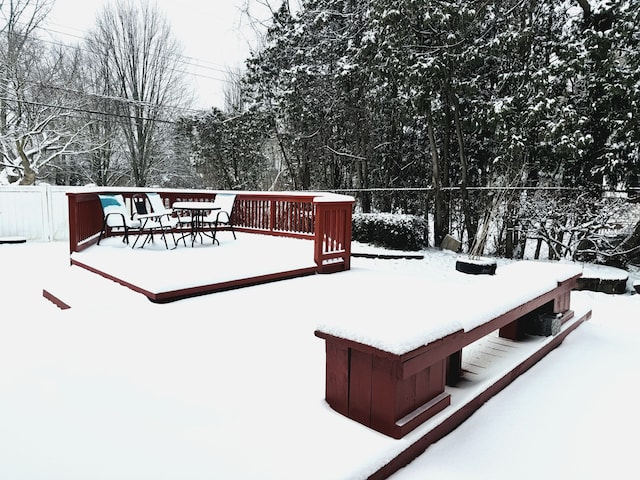 view of snow covered deck