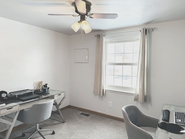 office with carpet and ceiling fan