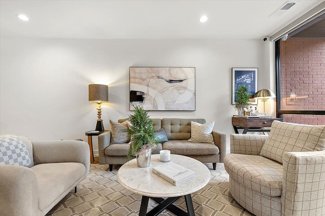 living room featuring visible vents and recessed lighting