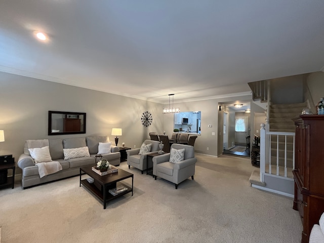 carpeted living room with ornamental molding