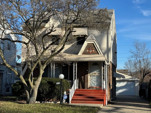 view of front of home featuring a garage and an outdoor structure