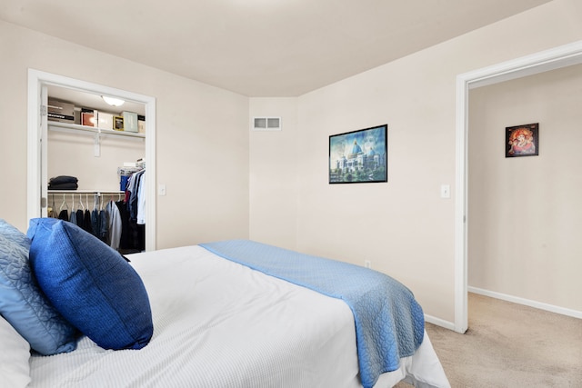 carpeted bedroom with a closet