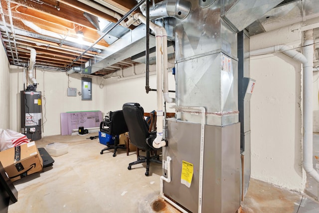 basement with electric panel, heating unit, and water heater